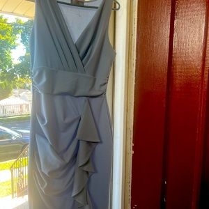 Mid-thigh baby blue dress.